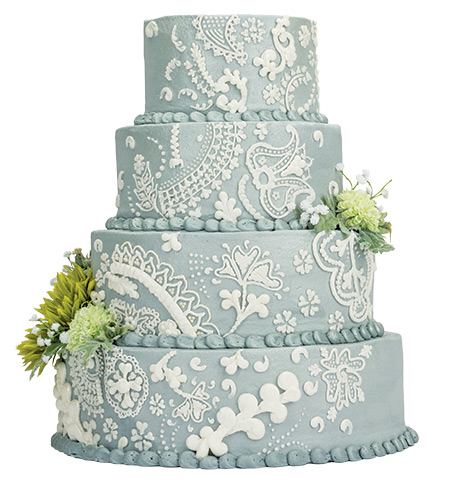 Feast Your Eyes......on this four-tiered cake that features delicate lace details piped over a shimmery buttercream. 
<br>
Cannon’s Cakes, 228 Astro Shopping Center, Newark, 368.7900, cannonscakes.com
