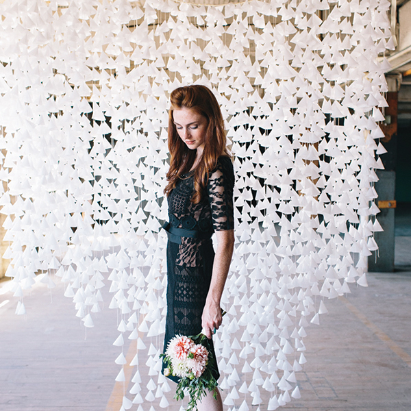 A wax-paper backdrop (Photo by Allie Rae Photography, backdrop design by Katie M Kulper via <a href="http://www.stylemepretty.com/2013/09/27/diy-wax-paper-backdrop">Style Me Pretty</a>)