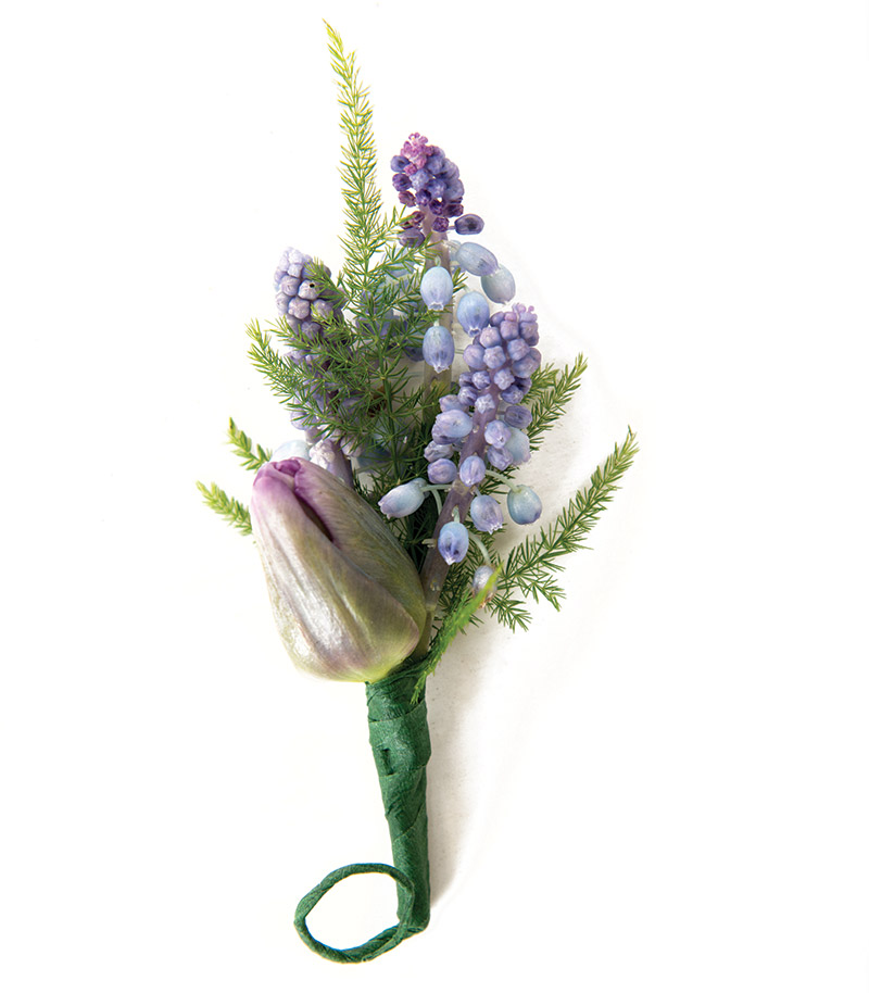 Blue muscari with purple tulip from Bloomsberry Flowers.
