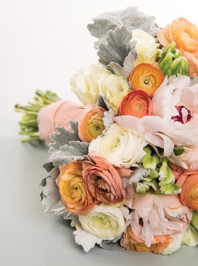 White and peach ranunculus,  white lisianthus and blush peonies from Flower Tales in Bala Cynwyd, Pa.