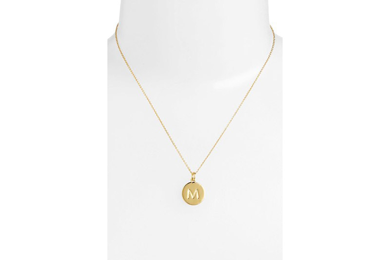 2. Personalized Initial Necklaces
This initial necklace from classic brand Kate Spade has “One in a million” engraved on one side and a bridesmaid’s first initial on the other. She’ll think of you every time she looks in her jewelry box. 
Kate Spade New York, “One in a Million” necklace, $58, Nordstrom.com
