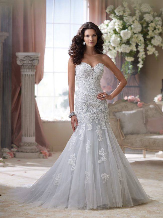 David Tutera for Mon Cheri Style 114293—Beryl: Enchanting sea mist strapless lace dress with embroidered lace and tulle over memory taffeta. $1,573 at Brides 2 Be By Hope Mitchell, Rehoboth Beach. 