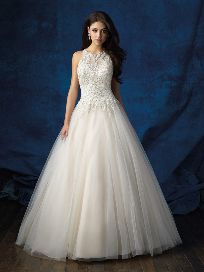 Allure Bridals Style 9359: This champagne regal ball gown features a high neck and elegant beadwork. $1,528 at Brides 2 Be By Hope Mitchell.  