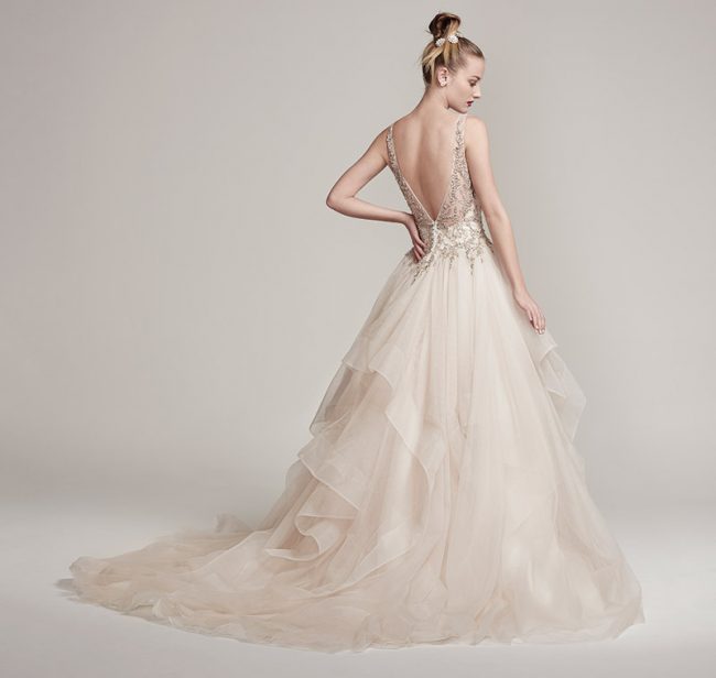 Maggie Sottero Midgley-Amelie: Dione organza creates the dramatic Amelie ball gown with horsehair layered skirt, featuring a bodice adorned with Swarovski crystals and pearls, plunging V-neckline and back. $2,249 at Brides 2 Be By Hope Mitchell.  