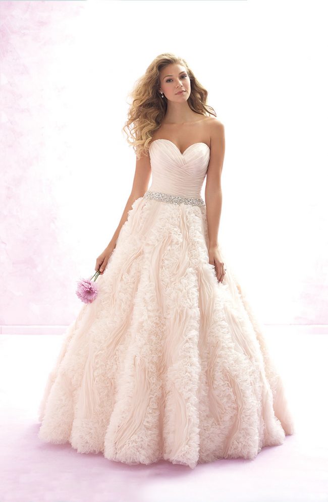 Madison James Bridal Style MJ120: Features gossamer ruffles and pleats throughout the bodice and skirt. $2,360 at Claire’s Fashions.