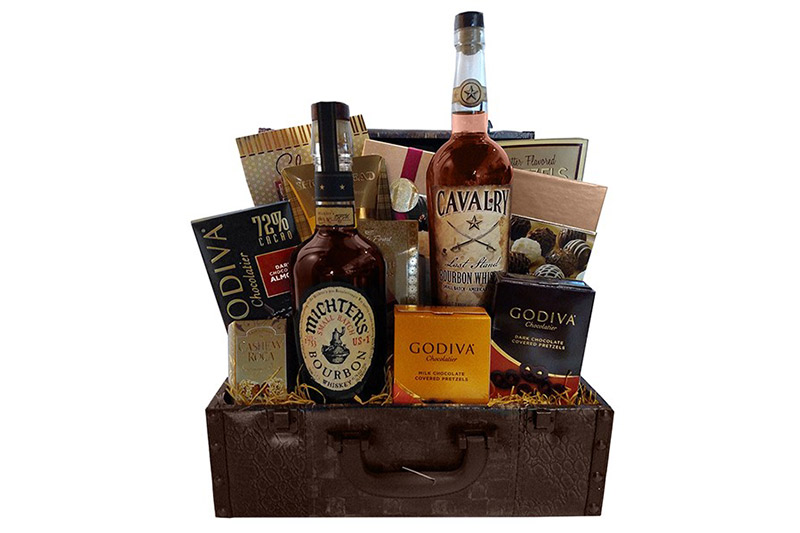 This basket includes a bottle of Cavalry Last Stand Bourbon Whiskey and Mitcher’s US 1 Small Batch Bourbon. Chocolate and shortbread cookies accompany the gift. 
$145, buildabasket.com
