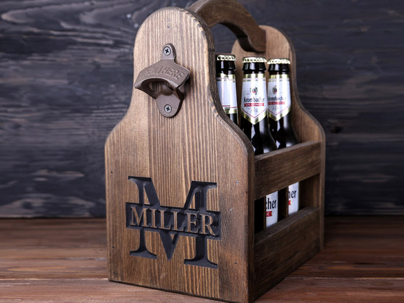 Personalize a custom six-pack carrier for each of the guys. These wooden six-packs can be personalized with a first or last name. 
$36.95, etsy.com

