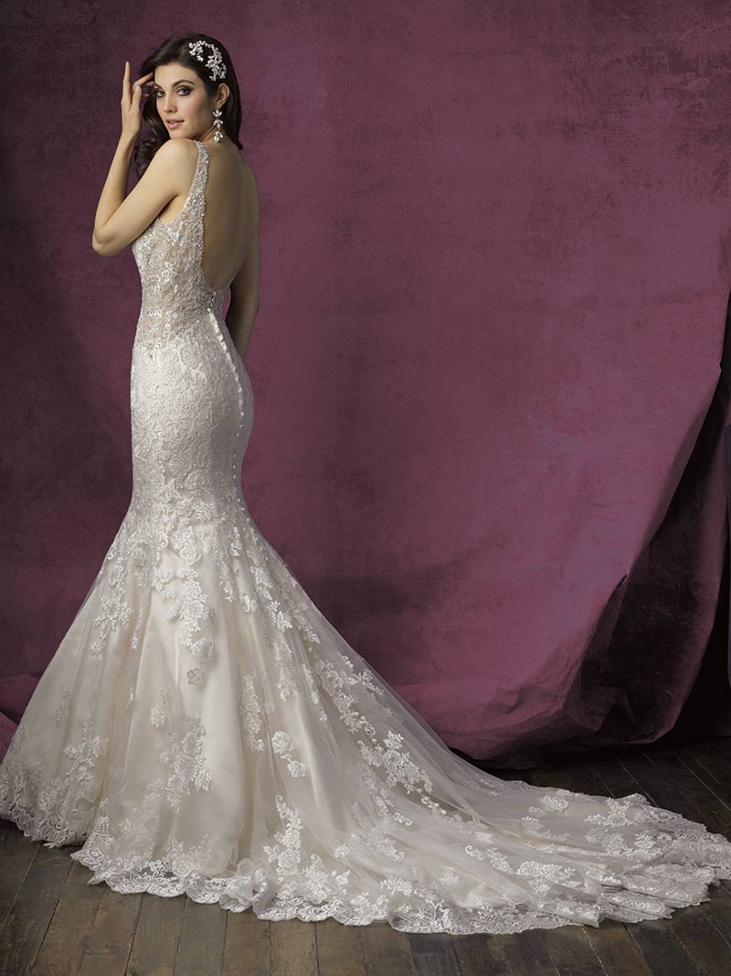 (Allure Bridals Style 9356) Satin and lace gown stuns from the front and the back. Features clean lines but plenty of sparkle and detailing.
$1,753, Brides 2 Be by Hope Mitchell,
Rehoboth, Del, www.brides2bebyhope.com.