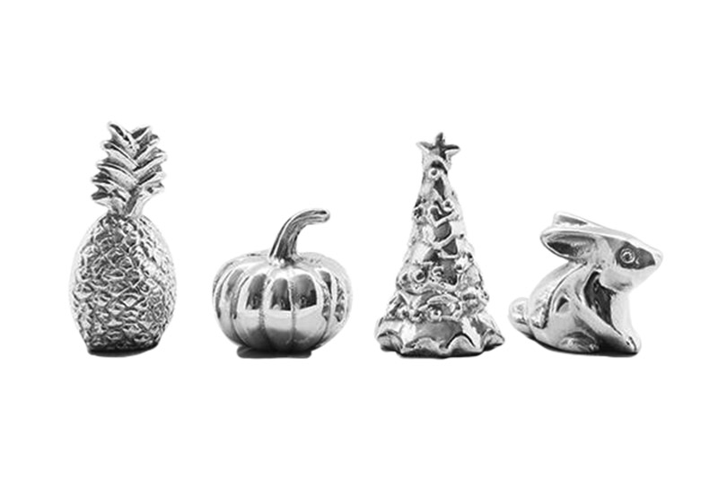 <strong>2. Christmas Pieces</strong> 
New couples will often be in charge of hosting holiday get-togethers but soon realize they have very few decorations.
Mariposa Pineapple, Pumpkin, Bunny & Christmas Tree weights, $54, The Little House Shop.
