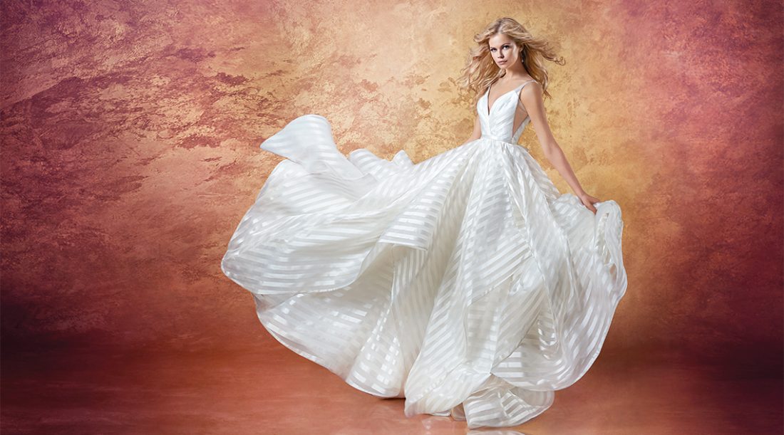 Hayley Paige Style Decklyn | This anything-but-ordinary ball gown is modern and playful. The ballerina bodice pairs perfectly with the full cascading skirt. $2,860, Jennifer’s Bridal, Hockessin, Del., jennifersbridal.com