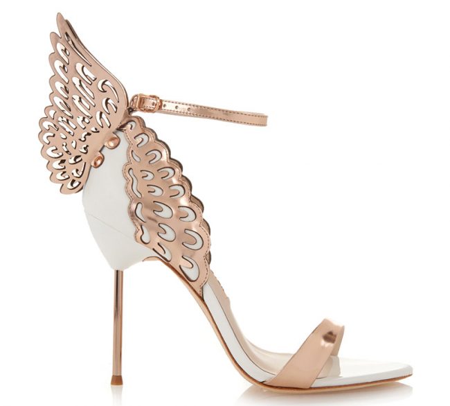 Evangeline Angel Wing Sandal By Sophia Webster | This rose gold and white shoe needs no introduction. It is perfect for the bride who wants something whimsical, avant-garde and extremely sexy. $560, www.neimanmarcus.com, Neiman Marcus, King of Prussia Mall, 170 N. Gulph Road, King of Prussia, (610) 962-6200.