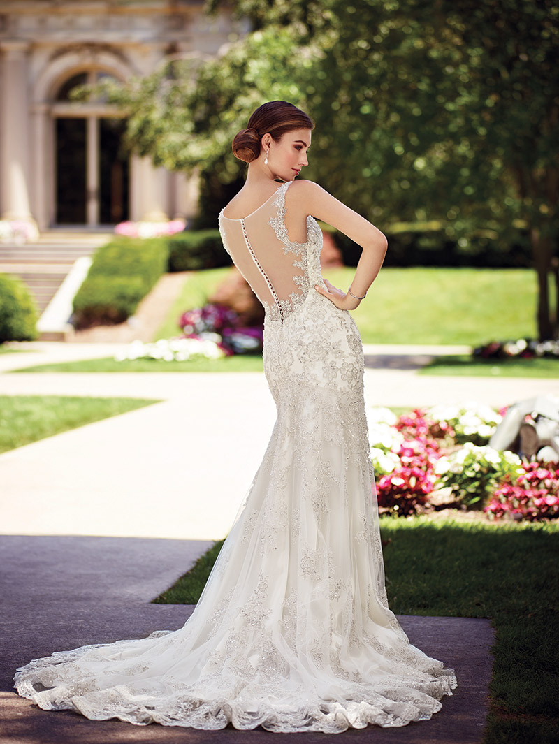 (David Tutera for Mon Cheri Style Chrisann) This satin sheath features scalloped lace straps, a plunging V-neckline, a beaded lace bodice with dropped waist, scalloped a hemline and chapel length train. $1,798, Brides 2 Be by Hope Mitchell Rehoboth, Del., www.brides2bebyhope.com  